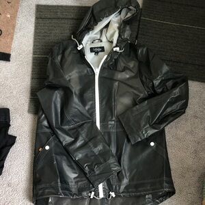 Stylish Black Raincoat with Hood says size large fits like a medium